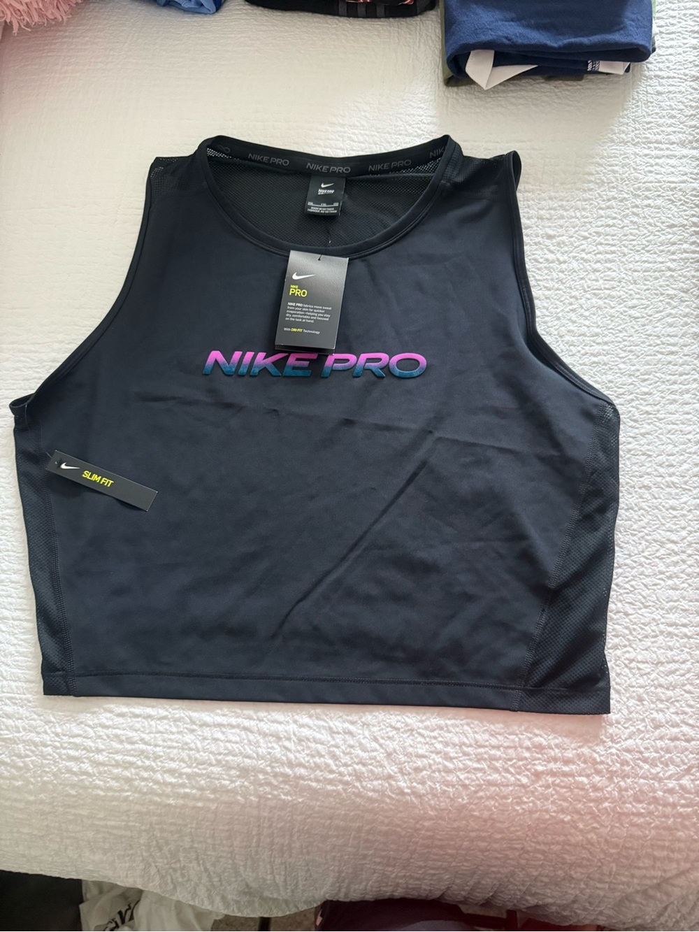 Nike Black Cropped Tank with Pink-to-Blue Gradient Logo